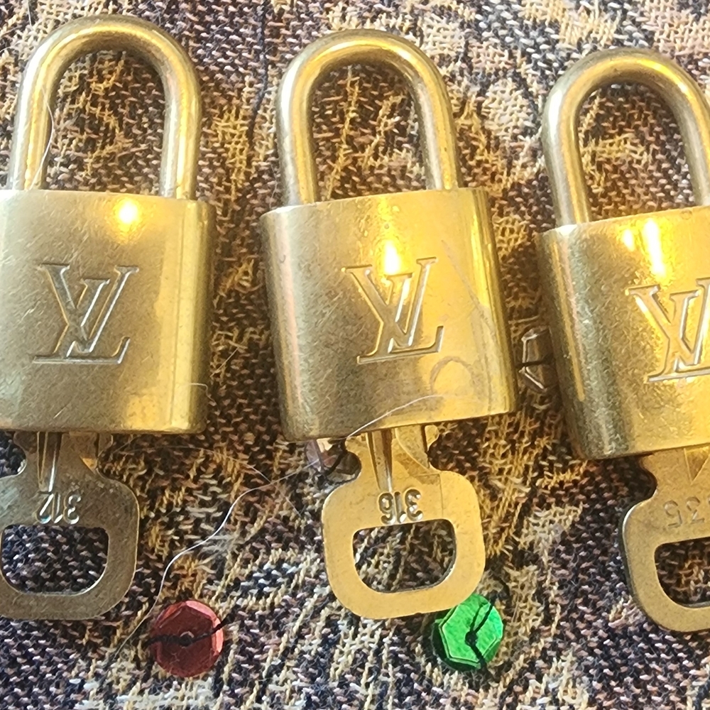 Louis Vuitton Gold Padlocks For 1